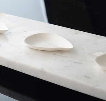Conserveware Bagasse Mini Leaf Dishes. 1 oz. 3.6 x 2.3 X 0.4 in. White. 25/bag, 20 bags/case.