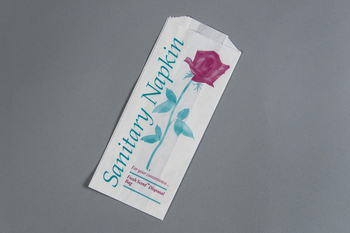 Sanitary Napkin Bag.  4" x 2-1/2" x 9".  Red and Teal Rose Design.