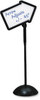 A Picture of product SAF-4117BL Safco® WriteWay™ Double-Sided Dry Erase Standing Message Sign Magnetic Rectangle, 65" Tall Black Stand, 14.25 x 22.25 White Face