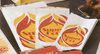 A Picture of product 209-251 Foil-In Thermal Bag.  For Hot Foods.  6-1/2" x 4-3/8" x 14".  1/2 Gallon Size.  Printed "Superhot" Design, in Red/Yellow Colors.